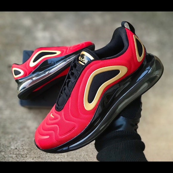 red and gold nike shoes